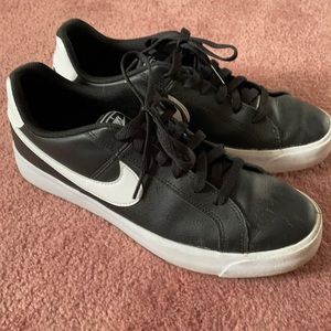 Nike sneakers. Size 10. Black and white. Leather upper.